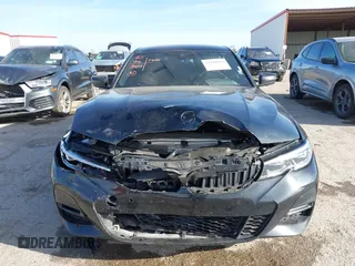 2021 BMW 3 Series 330i z VIN 3MW5R1J05M8B84800, wystawiony jako IAAI lot #41818906 z przebiegiem Nie podano mil oraz . Historia ofert i sprzedaży dostępna na DreamBid. Obrazek 12.