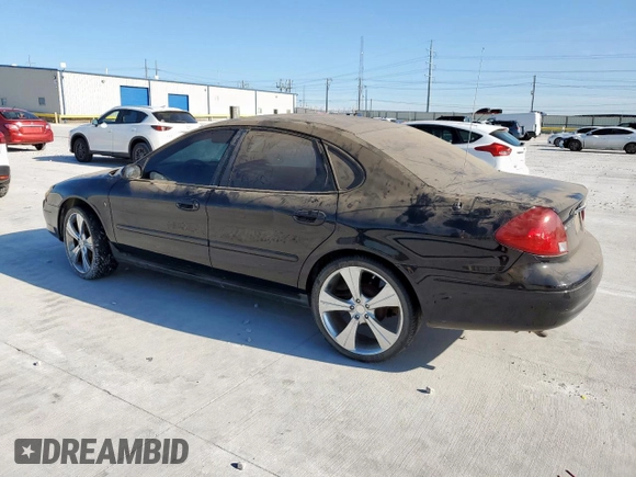 2002 Ford Taurus SE с VIN 1FAFP53252A202836, выставлен на аукционе Copart как лот 62285265 с пробегом 206 916 миль миль и Чистый • Clean title. История ставок и продаж доступна на DreamBid. Изображение 2.