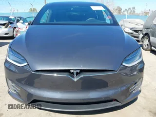 2018 Tesla Model X 75D with VIN 5YJXCBE26JF121937, listed as a IAAI auction lot 41652666 with 93,478 mi miles and . Bid and sale history available at carsss.com. Image 12.