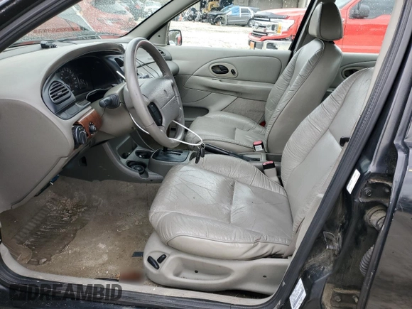 1998 Mercury Mystique z VIN 1MEFM66L7WK639796, wystawiony jako Copart lot #52880105 z przebiegiem 254 649 mil mil oraz Nie do naprawy • Non repairable. Historia ofert i sprzedaży dostępna na DreamBid. Obrazek 7.