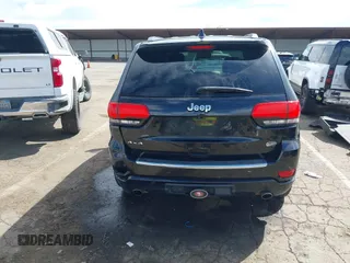 2014 Jeep Grand Cherokee Overland with VIN 1C4RJFCT8EC106005, listed as a IAAI auction lot 41989721 with 148,469 mi miles and . Bid and sale history available at DreamBid. Image 17.