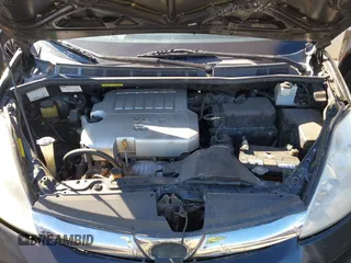 2009 Toyota Sienna XLE with VIN 5TDZK22C69S273555, listed as a IAAI auction lot 41276221 with 129,160 mi miles and . Bid and sale history available at DreamBid. Image 10.