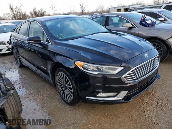 2018 Ford Fusion Titanium with VIN 3FA6P0RU5JR120394, listed as a Copart auction lot 73557602 with 148,870 mi miles and . Bid and sale history available at DreamBid. Image 4.