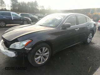 2011 Infiniti M37 with VIN JN1BY1AR6BM374647, listed as a IAAI auction lot 37949396 with 182,645 mi miles. Bid and sale history available at carsss.com. Image 2.