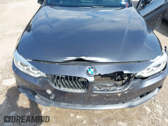2015 BMW 4 Series 428i xDrive z VIN WBA3N5C55FK484938, wystawiony jako IAAI lot #41889907 z przebiegiem 100 439 mil mil oraz . Historia ofert i sprzedaży dostępna na DreamBid. Obrazek 10.