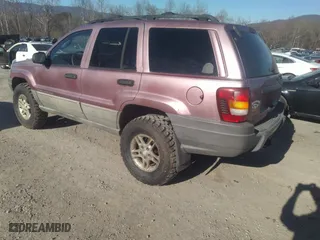 2002 Jeep Grand Cherokee Laredo with VIN 1J4GW48S92C169827, listed as a IAAI auction lot 41621901 with 169,373 mi miles. Bid and sale history available at carsss.com. Image 3.