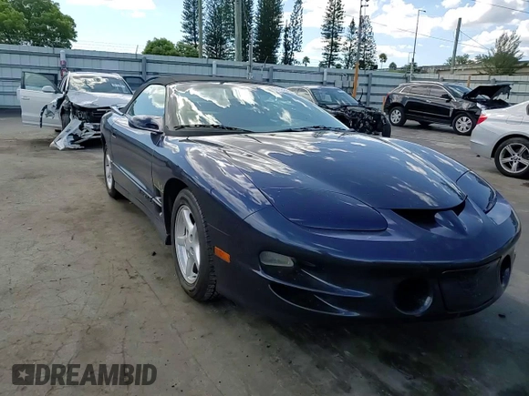 1999 Pontiac Firebird Trans Am with VIN 2G2FV32GXX2229175, listed as a Copart auction lot 65678225 with 180,298 mi miles and Salvage title. Bid and sale history available at DreamBid. Image 13.