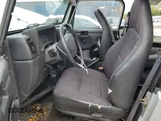 2002 Jeep Wrangler Sport with VIN 1J4FA49S32P733909, listed as a Copart auction lot 72776204 with 157,508 mi miles and Non Repairable. Bid and sale history available at carsss.com. Image 7.
