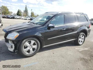 2010 Mercedes-Benz GL-Class GL 450 with VIN 4JGBF7BE3AA542886, listed as a Copart auction lot 52047485 with 95,665 mi miles and Salvage Title. Bid and sale history available at carsss.com. Image 1.