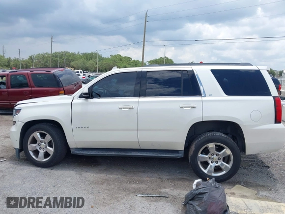 2015 Chevrolet Tahoe LT with VIN 1GNSCBKC0FR739951, listed as a IAAI auction lot 42332982 with 133,046 mi miles and . Bid and sale history available at DreamBid. Image 14.