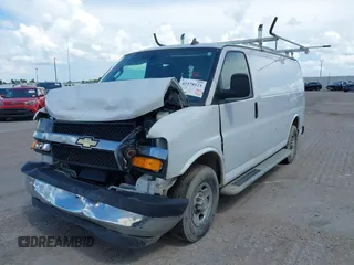 2021 Chevrolet Express Cargo with VIN 1GCWGAFP5M1258210, listed as a IAAI auction lot 42378121 with 50,438 mi miles and . Bid and sale history available at DreamBid. Image 2.