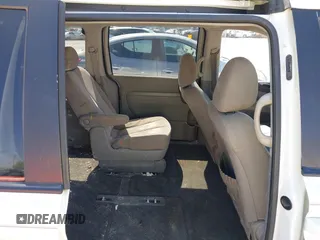 2011 Kia Sedona LX with VIN KNDMG4C79B6409885, listed as a IAAI auction lot 41971702 with 374,233 mi miles. Bid and sale history available at carsss.com. Image 8.