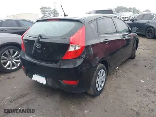 2013 Hyundai Accent GL with VIN KMHCT5AE4DU138789, listed as a IAAI auction lot 41536803 with 162,212 mi miles. Bid and sale history available at carsss.com. Image 4.