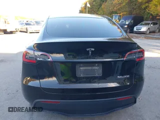 2020 Tesla Model Y Long Range with VIN 5YJYGDEF2LF037298, listed as a IAAI auction lot 37832056 with 40,417 mi miles and . Bid and sale history available at DreamBid. Image 17.