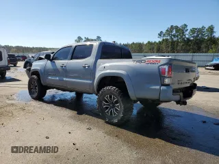 2020 Toyota Tacoma SR5 z VIN 3TMCZ5AN3LM328007, wystawiony jako Copart lot #50359925 z przebiegiem 81 091 mil mil oraz Szkoda całkowita • Salvage title. Historia ofert i sprzedaży dostępna na DreamBid. Obrazek 2.