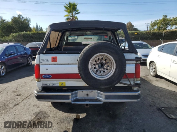 1989 Ford Bronco Custom с VIN 1FMEU15H0KLB48449, выставлен на аукционе Copart как лот 78316474 с пробегом 82 957 миль миль и Чистый • Clean title. История ставок и продаж доступна на DreamBid. Изображение 6.