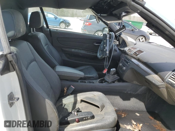 2010 BMW 1 Series 128i with VIN WBAUN1C5XAVH81789, listed as a Copart auction lot 49798465 with 128,859 mi miles and Clean title. Bid and sale history available at DreamBid. Image 10.