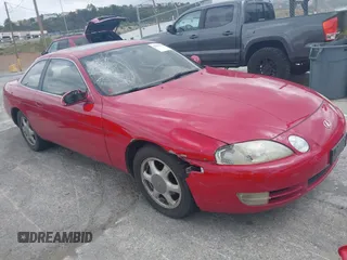 1996 Lexus SC 300 z VIN JT8CD32Z3T0034600, wystawiony jako IAAI lot #42106378 z przebiegiem 163 126 mil mil oraz . Historia ofert i sprzedaży dostępna na DreamBid. Obrazek 1.