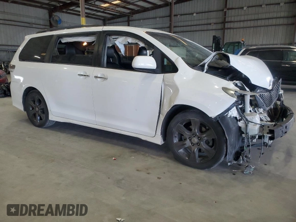 2015 Toyota Sienna SE with VIN 5TDXK3DC8FS662302, listed as a Copart auction lot 57995425 with 181,379 mi miles and Salvage title. Bid and sale history available at DreamBid. Image 4.