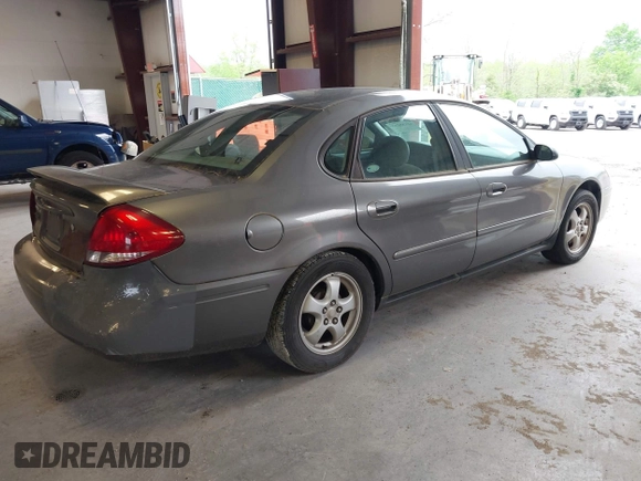 2005 Ford Taurus SE with VIN 1FAFP53U75A130186, listed as a IAAI auction lot 42155233 with 185,896 mi miles and . Bid and sale history available at DreamBid. Image 4.