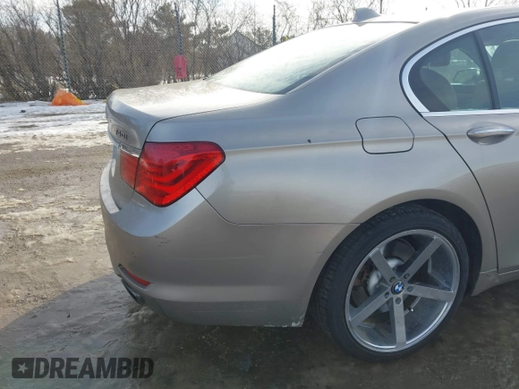 2012 BMW 7 Series 740i with VIN WBAKA4C58CDS99381, listed as a IAAI auction lot 41655715 with 112,731 mi miles and . Bid and sale history available at DreamBid. Image 6.