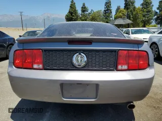 2007 Ford Mustang Deluxe with VIN 1ZVFT80N775319949, listed as a Copart auction lot 57623665 with 128,972 mi miles and Salvage title. Bid and sale history available at DreamBid. Image 6.