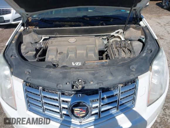2013 Cadillac SRX Premium Collection with VIN 3GYFNEE33DS554556, listed as a IAAI auction lot 42152972 with 144,668 mi miles and . Bid and sale history available at DreamBid. Image 10.