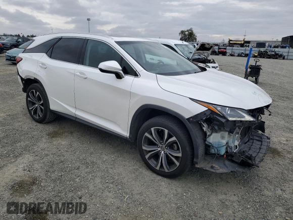 2018 Lexus RX 350L Premium with VIN JTJDZKCA4J2008001, listed as a Copart auction lot 47625985 with 71,324 mi miles and Salvage Title. Bid and sale history available at DreamBid. Image 4.