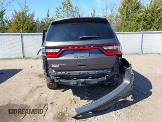 2021 Dodge Durango SXT with VIN 1C4RDHAG9MC761880, listed as a IAAI auction lot 41661298 with 73,171 mi miles and . Bid and sale history available at DreamBid. Image 6.