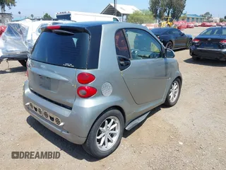 2008 Smart fortwo Pure with VIN WMEEJ31X08K139496, listed as a IAAI auction lot 42467749 with 108,787 mi miles and . Bid and sale history available at DreamBid. Image 4.