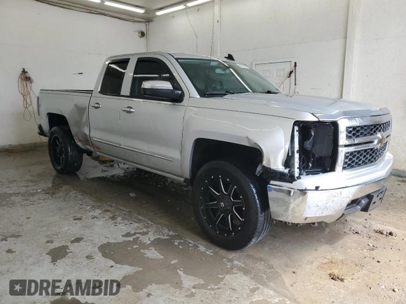 2015 Chevrolet Silverado 1500 LS with VIN 1GCRCPEH2FZ333438, listed as a Copart auction lot 54342505 with 215,852 mi miles and Salvage Title. Bid and sale history available at DreamBid. Image 4.