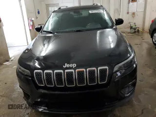 2019 Jeep Cherokee Latitude with VIN 1C4PJLCB9KD396600, listed as a Copart auction lot 59727555 with 125,893 mi miles and Salvage title. Bid and sale history available at DreamBid. Image 5.