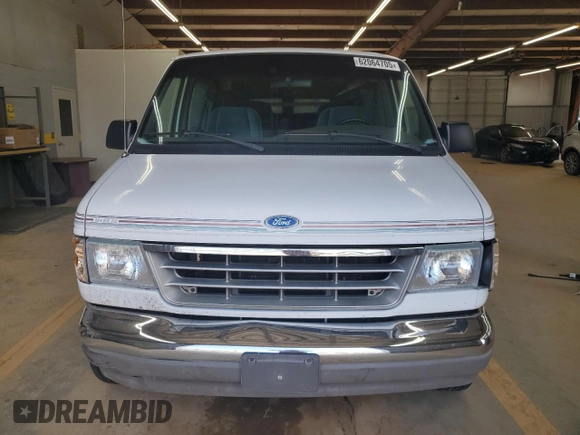 1993 Ford Econoline Cargo with VIN 1FDEE14Y5PHA07711, listed as a Copart auction lot 62064705 with 150,336 mi miles and Salvage title. Bid and sale history available at DreamBid. Image 5.