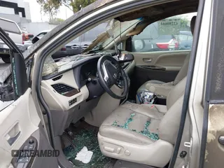 2015 Toyota Sienna XLE with VIN 5TDYK3DC5FS545345, listed as a IAAI auction lot 42280661 with Not provided miles and . Bid and sale history available at DreamBid. Image 13.