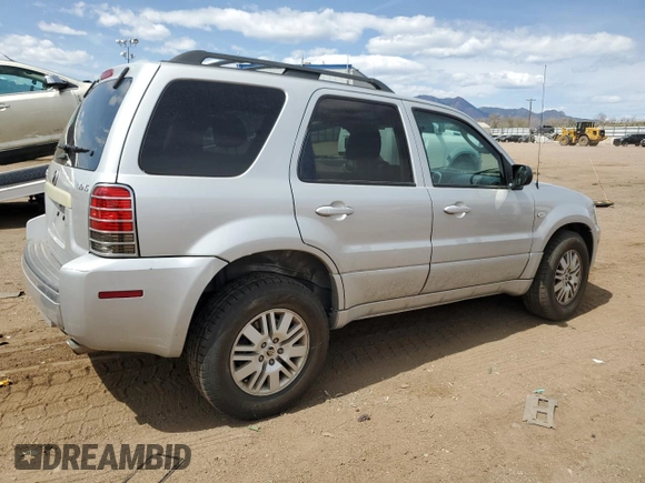 2007 Mercury Mariner Luxury z VIN 4M2YU91117KJ02032, wystawiony jako Copart lot #50418815 z przebiegiem 128 498 mil mil oraz Szkoda całkowita • Salvage title. Historia ofert i sprzedaży dostępna na DreamBid. Obrazek 3.