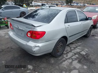 2004 Toyota Corolla CE with VIN 1NXBR32E24Z275615, listed as a IAAI auction lot 42180665 with 210,598 mi miles and . Bid and sale history available at DreamBid. Image 4.
