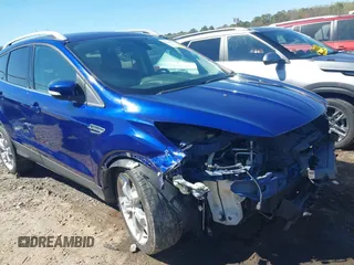 2015 Ford Escape Titanium with VIN 1FMCU0J93FUC20745, listed as a IAAI auction lot 41781551 with 174,538 mi miles and . Bid and sale history available at DreamBid. Image 6.
