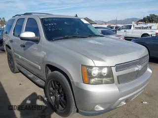 2007 Chevrolet Tahoe LTZ with VIN 1GNFC13077J399911, listed as a IAAI auction lot 41141878 with Not provided miles and . Bid and sale history available at DreamBid. Image 1.