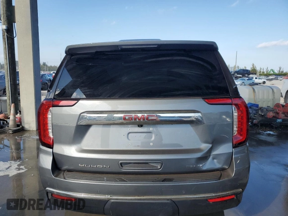 2021 GMC Yukon SLT with VIN 1GKS2BKD4MR123045, listed as a Copart auction lot 86637604 with 100,182 mi miles and Salvage Title. Bid and sale history available at carsss.com. Image 6.