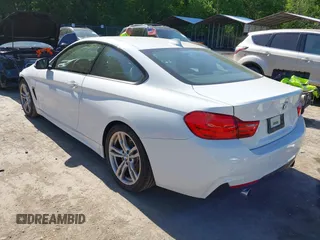 2014 BMW 4 Series 435i z VIN WBA3R1C51EK192103, wystawiony jako IAAI lot #42127351 z przebiegiem 99 023 mil mil oraz . Historia ofert i sprzedaży dostępna na DreamBid. Obrazek 3.