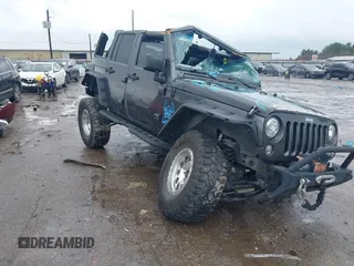 2018 Jeep Wrangler Unlimited Rubicon Recon with VIN 1C4BJWFG3JL840951, listed as a IAAI auction lot 41474583 with 121,971 mi miles and . Bid and sale history available at DreamBid. Image 1.