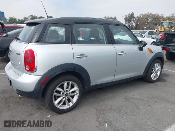 2013 MINI Countryman with VIN WMWZB3C5XDWM09519, listed as a IAAI auction lot 42665715 with 127,891 mi miles and . Bid and sale history available at DreamBid. Image 4.