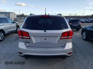 2014 Dodge Journey SXT z VIN 3C4PDDBG7ET282202, wystawiony jako Copart lot #82870614 z przebiegiem 153 404 mil mil oraz Czysty tytuł • Clean title. Historia ofert i sprzedaży dostępna na DreamBid. Obrazek 6.