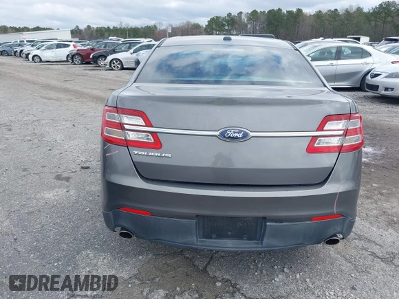2014 Ford Taurus SE z VIN 1FAHP2D88EG143275, wystawiony jako IAAI lot #41801787 z przebiegiem 150 988 mil mil oraz . Historia ofert i sprzedaży dostępna na DreamBid. Obrazek 17.