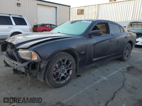 2011 Dodge Charger RT Plus with VIN 2B3CM5CT6BH517548, listed as a Copart auction lot 82219834 with 114,134 mi miles and Salvage Title. Bid and sale history available at carsss.com. Image 1.