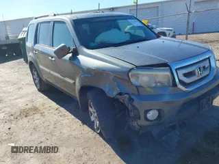 2010 Honda Pilot Touring with VIN 5FNYF4H93AB008589, listed as a IAAI auction lot 41731084 with 138,554 mi miles and . Bid and sale history available at carsss.com. Image 1.