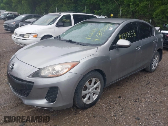 2013 Mazda 3 i SV z VIN JM1BL1TF2D1761375, wystawiony jako IAAI lot #42373558 z przebiegiem 150 196 mil mil oraz . Historia ofert i sprzedaży dostępna na DreamBid. Obrazek 2.