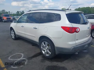 2011 Chevrolet Traverse LTZ with VIN 1GNKVLED5BJ167465, listed as a IAAI auction lot 42002979 with 167,271 mi miles and . Bid and sale history available at DreamBid. Image 3.