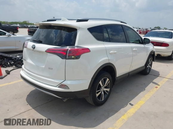 2018 Toyota RAV4 XLE с VIN JTMWFREV3JD121908, выставлен на аукционе IAAI как лот 42140675 с пробегом 114 819 миль миль и . История ставок и продаж доступна на DreamBid. Изображение 4.