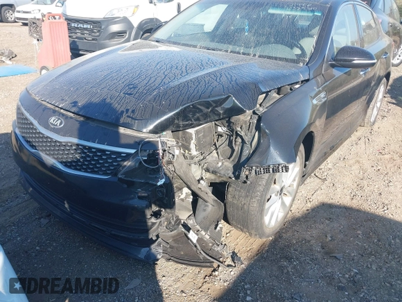 2016 Kia Optima EX with VIN 5XXGU4L39GG054891, listed as a IAAI auction lot 40325310 with 112,457 mi miles and . Bid and sale history available at DreamBid. Image 6.